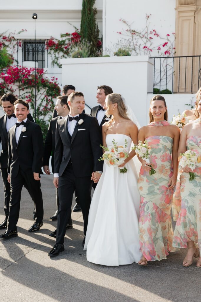 Bride and groom with their wedding party at Wrigley Mansion in Phoenix Arizona
